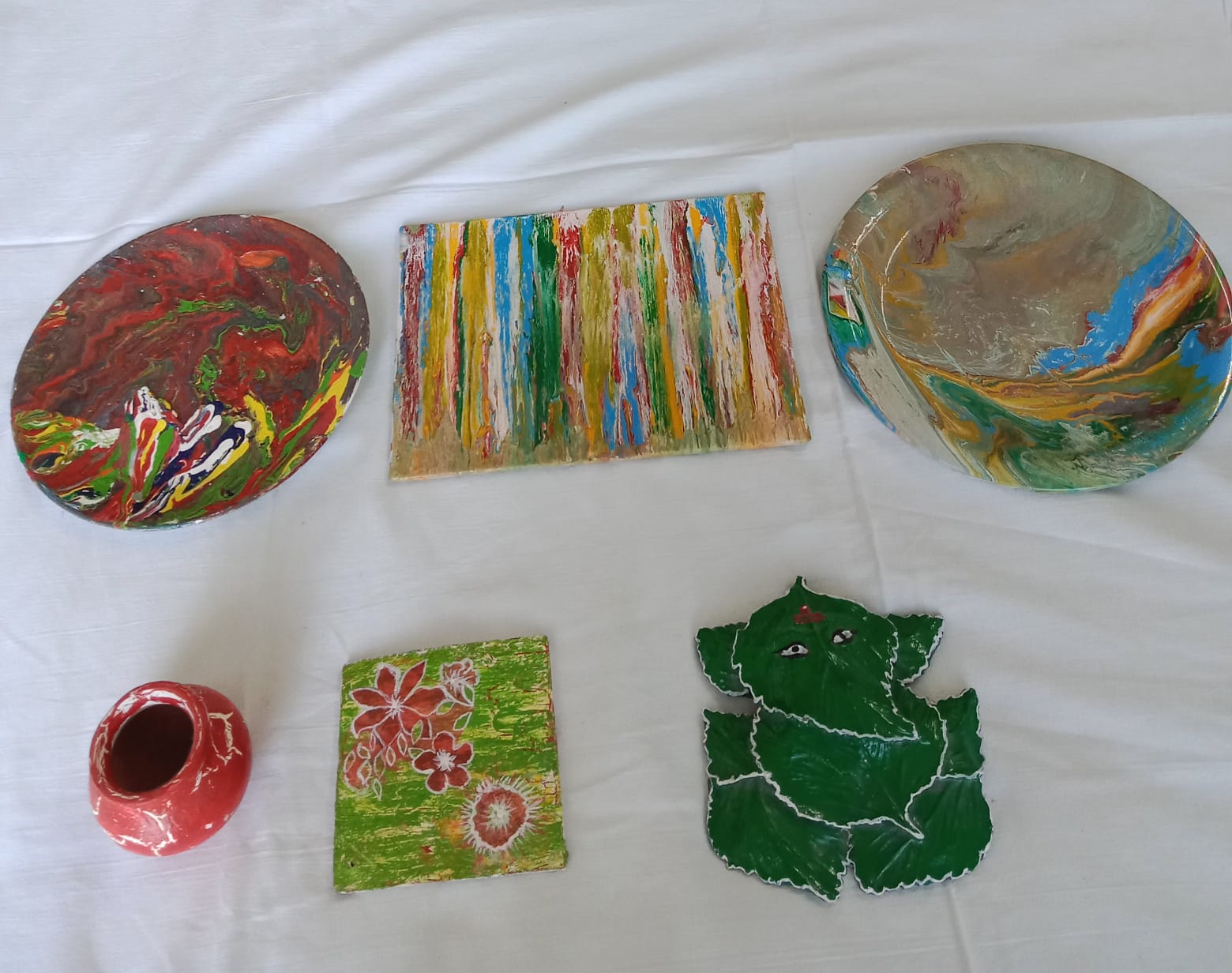 Colourful textured decorative plates and handmade pieces